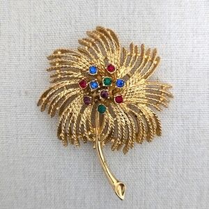 Sarah Coventry Flower Brooch Multicolor Rhinestone Center